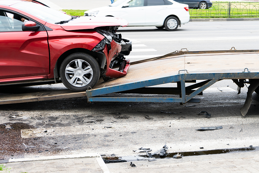 Tow Truck For Emergency Car Move. The Car After The Accident Is
